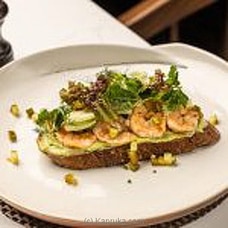 Grilled Marinated Prawns With Crushed Avocado On Sour Dough Toast Buy Cinnamon Grand Online for specialGifts